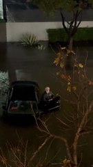 Elderly man rescued after car gets trapped in flash flood waters