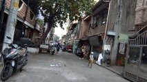 Kids Are Playing on Lt. Garcia Street in Paranaque City in the Philippines