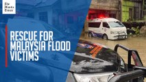 STILLS: Rescuers patients as Malaysian floods affect 11,000