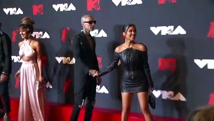 Kourtney Kardashian Jumps Into Travis Barker’s Arms After Blink 182 Reunites At Coachella For Early Birthday Celebration