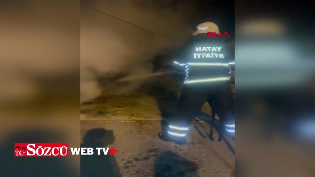 Evin bahçesindeki park halindeki otomobil yandı