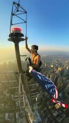 Reach! Above the Empire State Building, New York City, USA.