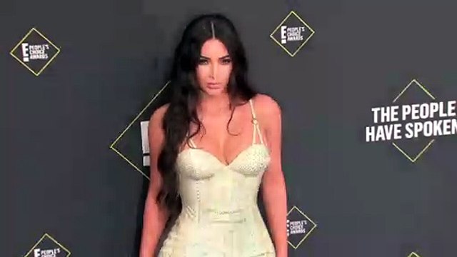 Kim Kardashian Rocks Silk Shorts To Debut Her New Beats x Kim Campaign