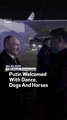 Putin Welcomed With Dance, Dogs And Horses