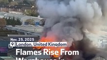 Flames Rise From Warehouse in West London