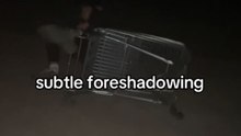 Boys send their friend rolling down a skatepark ramp in a trolley