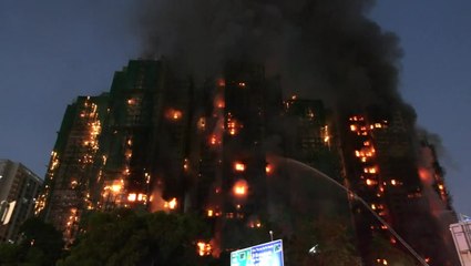Video: Deadly fire engulfs Hong Kong high-rise apartment blocks
