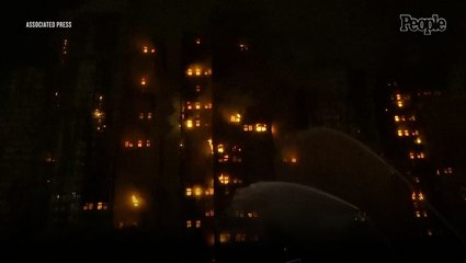 At Least 12 People Killed as Deadly Fire Rips Through Hong Kong Apartment Blocks