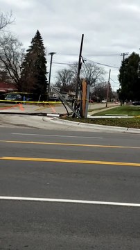 Wind gusts take out power poles on Ryan Road in Warren