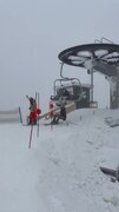 Friends Tangle Getting Off Ski Lift