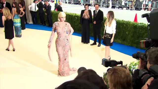 Kylie Jenner Seen Holding A Lit Cigarette To Her Mouth In A Behind-the-scenes Shot From Paris Fashion Week