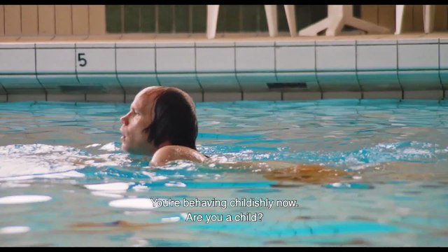 Badaren (Swimmer) - A Surreal Police Standoff in a Swimming Pool