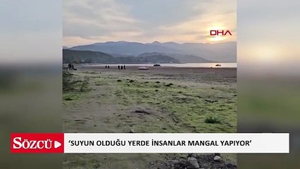 Sapanca Gölü'ndeki kuraklığa, ‘Suyun olduğu yerde insanlar mangal yapıyor’ görseliyle dikkat çekti