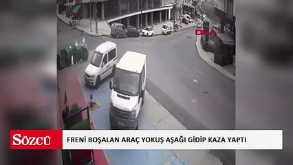 Beylikdüzü'nde park halinde freni boşalan hafif ticari araç yokuş aşağı kayarak otomobile çarptı