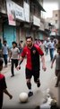 Messi playing street football with children