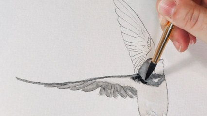 Artist paints a barn swallow that looks ready to take a flight