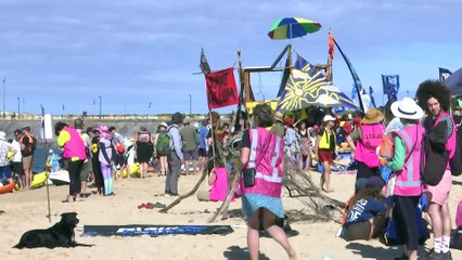 Thousands gather with canoes and flotillas for climate blockade in Newcastle