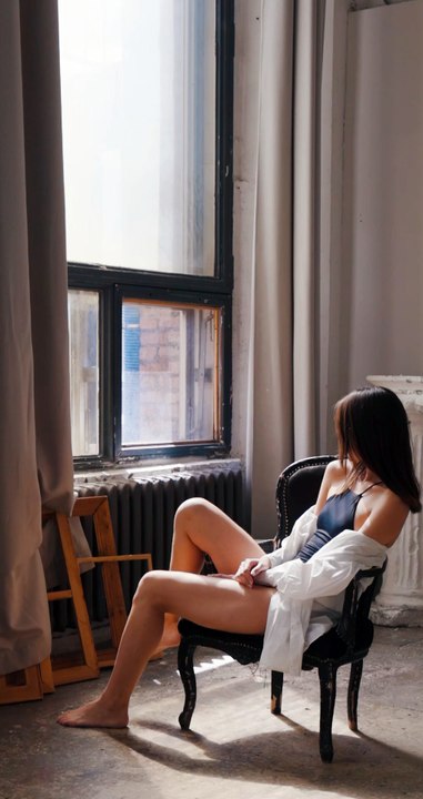 A Woman Looking Outside