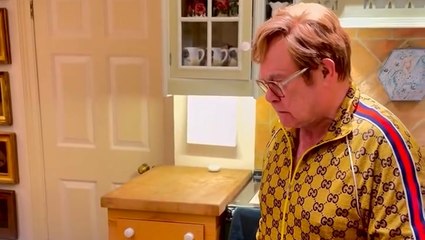 Elton John mocks his own Christmas hit with spoof video
