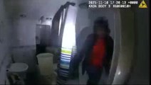 Police officer screams after pulling back shower curtain in basement raid