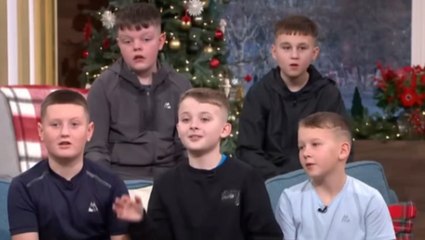 Viral Scottish carol-singing schoolboys burst into song during live interview