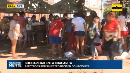 Afectados Por Incendio En Chacarita Reciben Donaciones