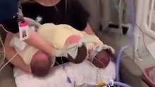 Mother holds baby for the first time