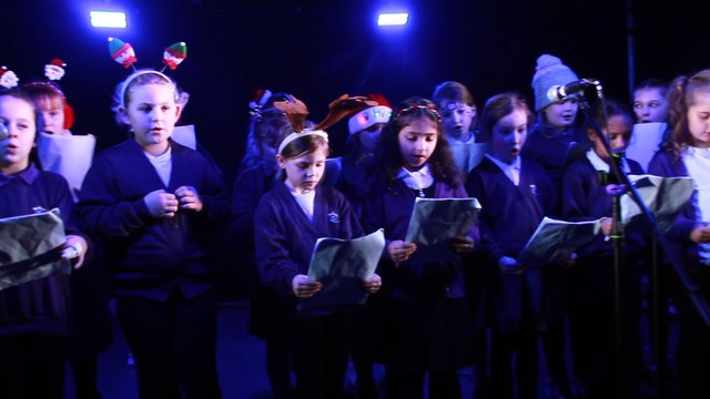 Minehead First School coir performing at the town's Christmas lights switch-on, filmed by George Ody.