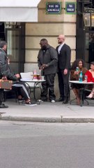 American rapper and businessman Rick Ross on a terrace in Paris
