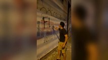 Activista boicotea pintatas electorales con humor e ironía en Asunción