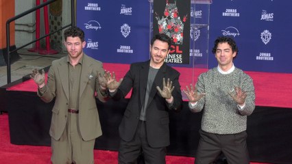 The Jonas Brothers immortalized in cement at Hollywood's world-famous TCL Chinese Theatre