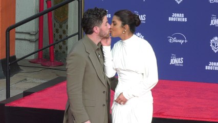 Joe Jonas and Priyanka Chopra pose together at the Jonas Brothers handprint-footprint ceremony in Hollywood