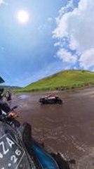 Biker Slips On Muddy Path