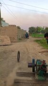 Loose Tire Spins Out of Control and Knocks Man to Ground