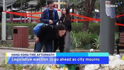 Hong Kong To Go On with Election As City Mourns Fire Victims