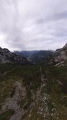 Base Jumper Takes Stunning Leap From Dolomites Mountain in Italy