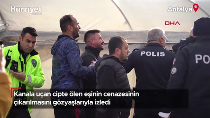 Kanala uçan cipte ölen eşinin cenazesinin çıkarılmasını gözyaşlarıyla izledi