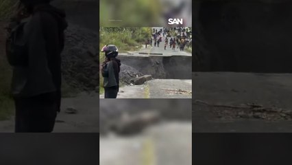 Road in Indonesia collapses following heavy rain and landslides