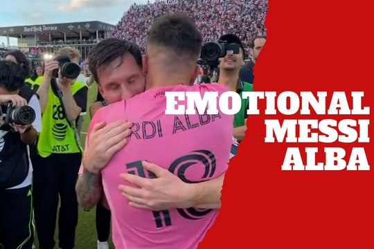 Lionel Messi and Jordi Alba share emotional embrace after winning the MLS championship on the field