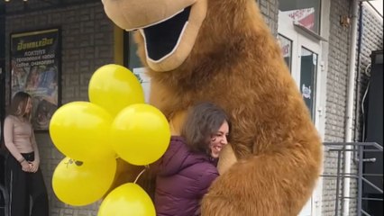 Bear from Masha and the Bear walks in to celebrate the girl's birthday