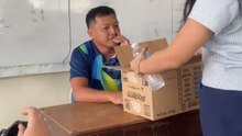 Students delight their teacher with a food box surprise in class