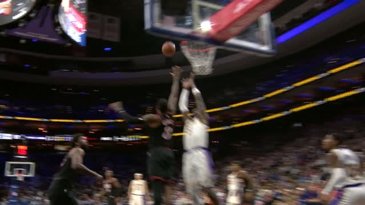 Doncic combines with Deandre Ayton for the alley-oop