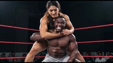Female bodybuilders dominate and toy with men in the wrestling arena.