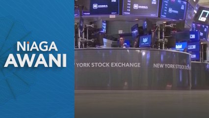 US stocks end lower as investors wait for Fed rate decision