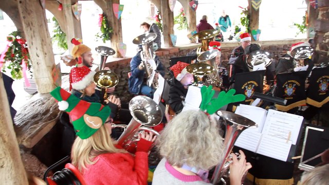 West Somerset Brass perform in Dunster Yarn Market during the village's winter festival, filmed by George Ody.