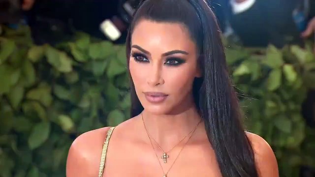 Kim Kardashian Says She’s In Her ‘Happy Era’ As She Blows Kisses In Sexy New Pics