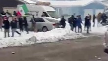 Illinois street erupts in smoke as crowd pelts officers with snowballs