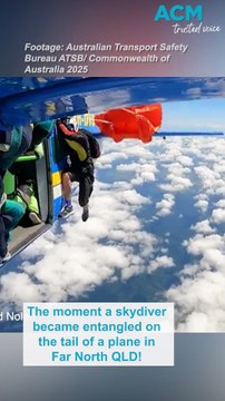Terrifying moment skydiver left dangling after parachute snags