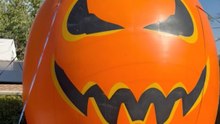 Giant pumpkin structure stands tall as part of Halloween display