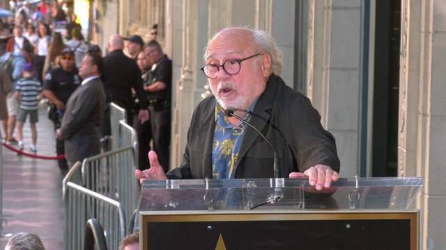 Danny DeVito gives a speech at James L. Brooks' Hollywood Walk of Fame star unveiling ceremony